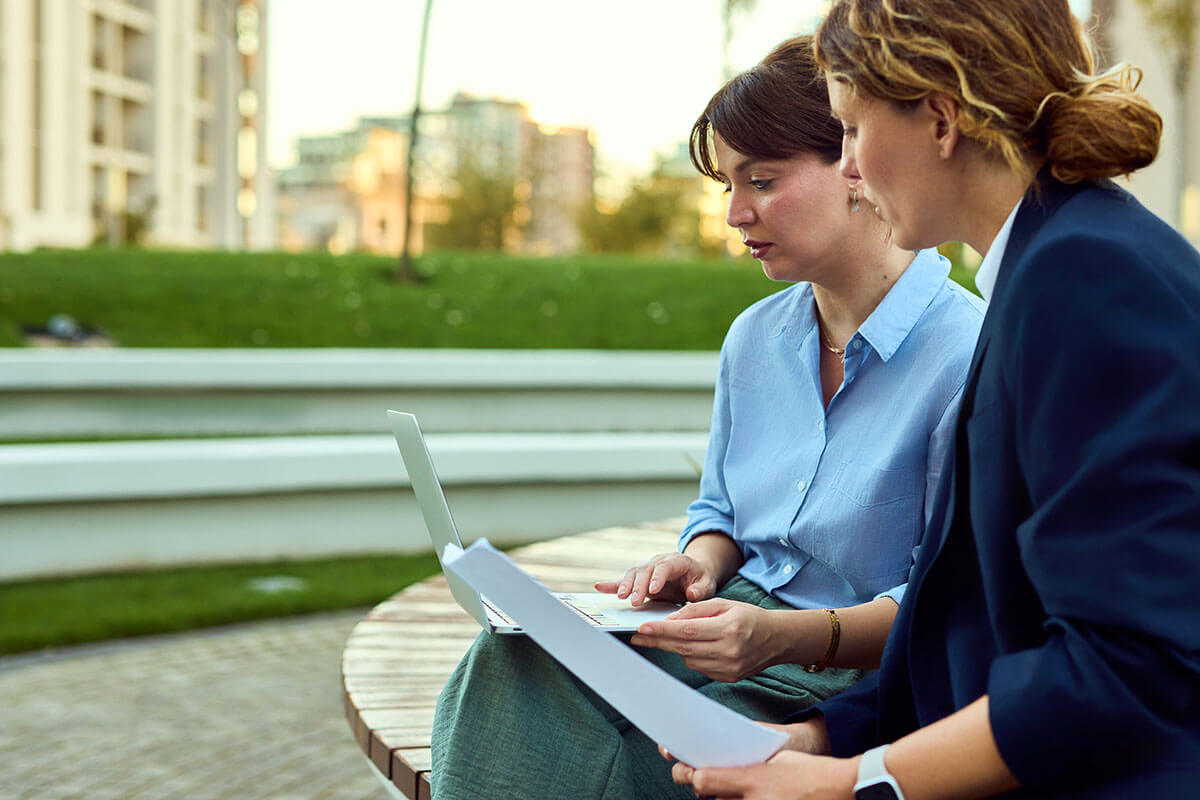 2 women collaborating